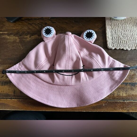 ADORABLE frog bucket hat I have pink and black one. Fits most all sizes. - Picture 7 of 9